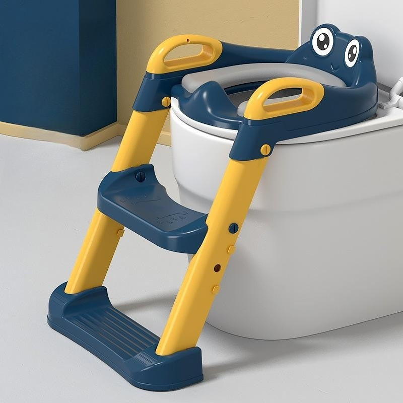 Összecsukható Laddo gyermek WC-szék kapaszkodóval és puha ülőkével